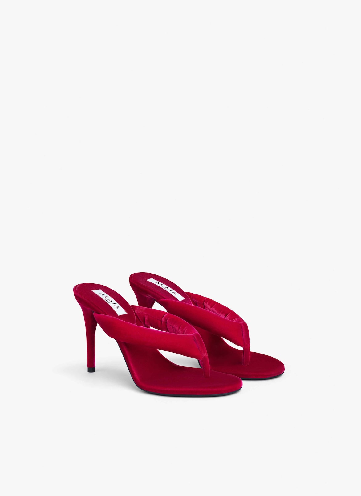 HEEL THONG MULES IN VELVET ALAÏA FUCHSIA HEEL THONG MULES IN VELVET